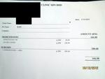 Receipt for his neutering. Details are blacked out to prevent reprinting for any misuse